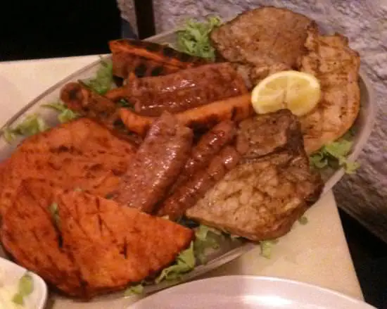 Da Richetto al Peralto locale di grande tradizione. Carne alla brace.