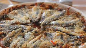 Acciughe e patate in tegame